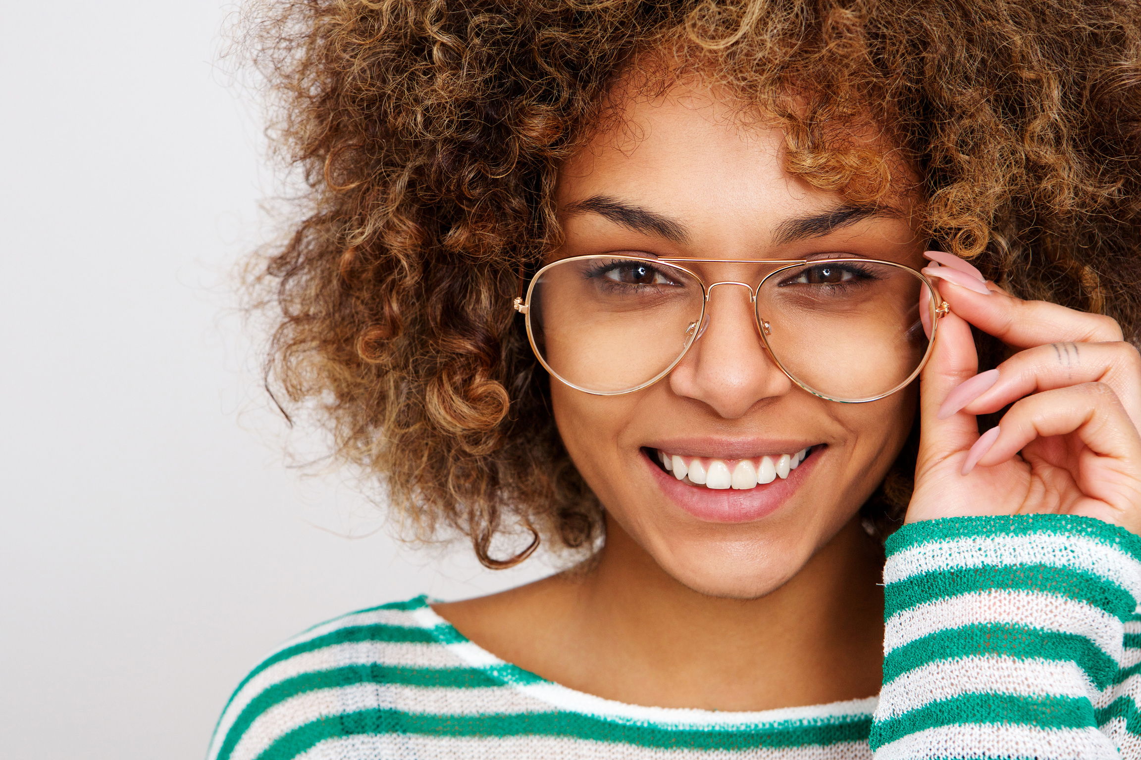 Beautiful Young Black Woman Smiling with Glasses